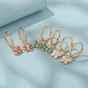 Macro detail of S925 sterling silver butterfly earrings with colorful zirconia stones