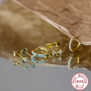 Set van gouden S925 sterling zilveren oorbellen met turquoise stenen en zirkonia