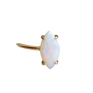 Marquise-cut opal ring with golden four-prong setting and minimalist metal band