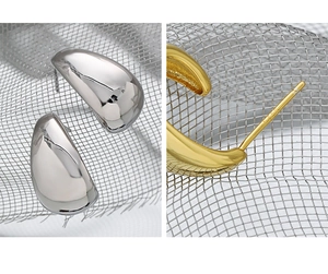 Macro view of S925 sterling silver hallmark on polished teardrop stud earrings