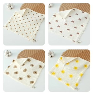 Detail of 4-pack baby cotton gauze towels with heart, rainbow, and bear patterns