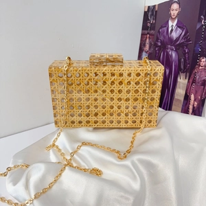 Vintage acrylic clutch bag with yellow rattan texture and golden metal chain strap