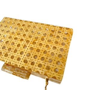 Retro rattan woven clutch with hexagonal weave pattern and gold chain strap