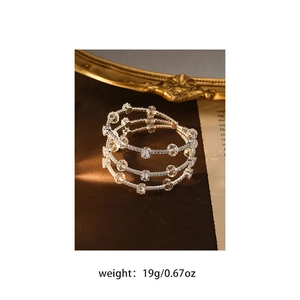 Detailed view of 19g multi-layer silver bracelet with clear beads and pavé crystals