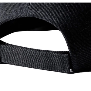 Rear view of a black cotton baseball cap showing adjustable strap and twill texture