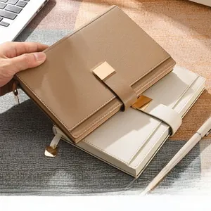 Detail of A5 business notebooks with thickened leather cover and metal buckle closure