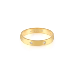 Close-up of S925 sterling silver gold ring featuring star-set sparkling zircon stones