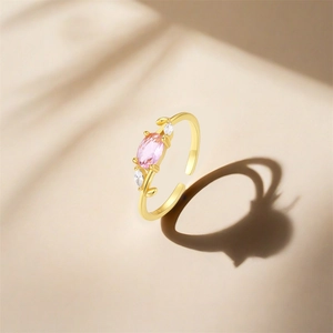 Macro shot of S925 sterling silver hallmark on adjustable gold plated pink zircon ring