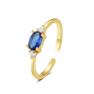 Detailed close-up of S925 silver stamp and blue oval gemstone on gold open ring
