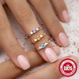 Three-piece set of S925 sterling silver rings with colorful zircon gems on model finger