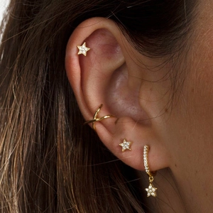 Detail showing S925 silver gold star moon earrings and cuff set with zircon stones