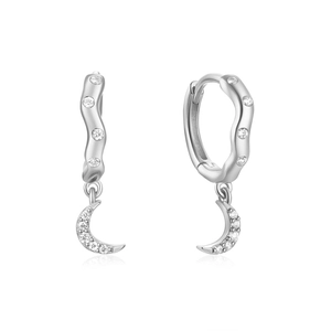 Detail view of S925 sterling silver asymmetrical star moon earrings with white zircon