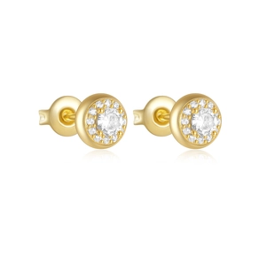 Gros plan de boucles d'oreilles halo dorées avec cristaux ronds et fermoirs à disque