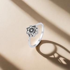 Macro shot of the S925 sterling silver stamp on a vintage lotus flower ring band