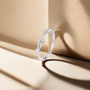 Detail view of S925 sterling silver ring showing the inner S925 hallmark and vine design