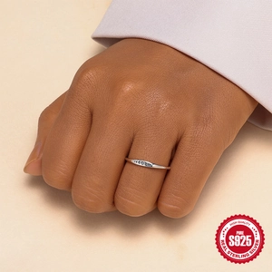 S925 sterling silver lotus ring with turquoise, moon phase design worn by a model