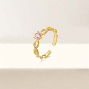 Detail of S925 sterling silver gold ring with pink zircon and butterfly chain link