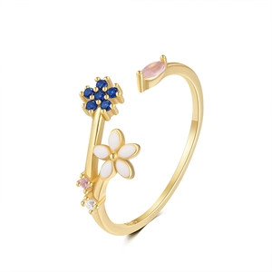 Detailed close-up of S925 silver stamp and colorful enamel floral motifs on the ring