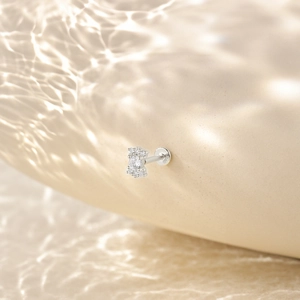 Macro view of S925 sterling silver helix earring with round crystal and screw flat back