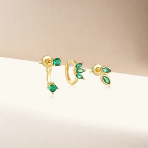 Detail view of gold-plated S925 silver earring set featuring green emerald gemstones