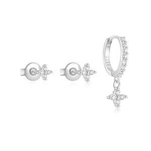 Macro shot of S925 sterling silver four-petal flower earrings set with zircon stones