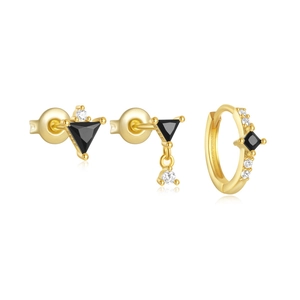 Detailed macro of gold S925 sterling silver earrings with black stone and cubic zirconia