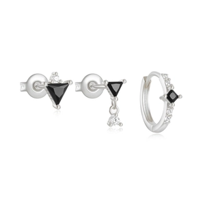 Macro shot of S925 sterling silver studs and hoop earring set with black gemstones