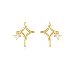 Detail von goldenen vierzackigen Sternohrringen mit einem runden Zirkonia-Steinbesatz