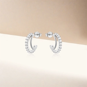 Close-up of S925 sterling silver hoop earrings with clear cubic zirconia pavé stones