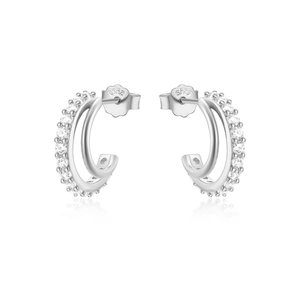 Macro detail of S925 sterling silver stamp on double-layer pavé cubic zirconia stud earrings
