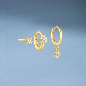 Detailed close-up of a 3-piece gold S925 silver earring set with floral zircon pendants