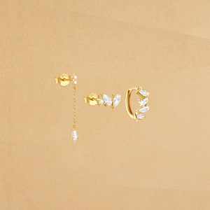 Macro detail of S925 hallmark on gold plated floral stud earrings and hoop set