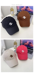 Detail view of multi-color cotton baseball caps with MW 3D embroidery and curved brim