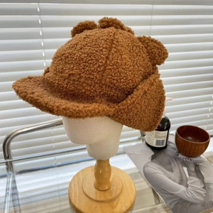 Brown teddy fleece trapper hat with bear ears and ear flaps for winter warmth