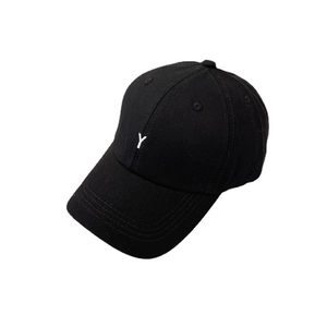 Classic black cotton baseball cap with white letter Y embroidery in a 45-degree side view