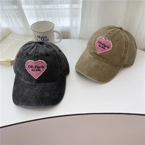 Vintage washed cotton baseball cap with pink heart embroidery and adjustable metal buckle