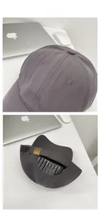 Detail view of quick-dry dark grey baseball cap with adjustable metal buckle closure