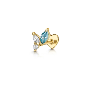 Macro view of gold butterfly earring with marquise blue stone and heart flat back