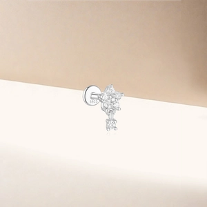 Macro shot of S925 sterling silver lotus cartilage stud showing fine cubic zirconia stones