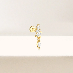 Macro shot of 925 sterling silver gold lotus earring with sparkling marquise zircons