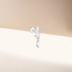 Macro detail of S925 sterling silver lotus piercing stud with marquise-cut marquise stones