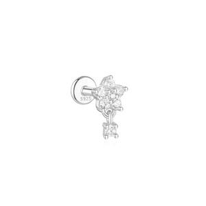 Macro view of S925 sterling silver lotus star cartilage earring with sparkling zircon detail