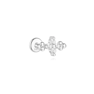 Macro detail of S925 sterling silver lotus piercing stud with sparkling zircons