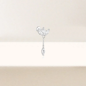 Macro shot of S925 sterling silver ear stud with marquise cubic zirconia and tassel chain