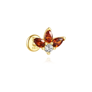 Detailed view of S925 silver earring with orange pear-cut stones and gold plating