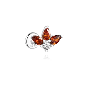 Macro view of S925 sterling silver earring with orange teardrop zircon and hallmark