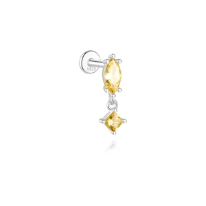 Detailed macro of S925 sterling silver ear stud with yellow marquise and square zircon