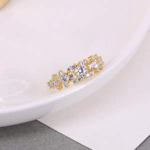 Detailed view of the gold-plated S925 silver ring featuring multi-size cubic zirconia clusters