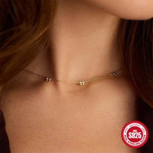 Collier ras du cou en argent S925 doré avec pendentifs nœuds élégants et discrets