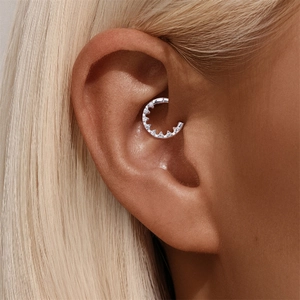 Detailed close-up of s925 silver Daith piercing ring featuring inlaid sparkling zircon stones